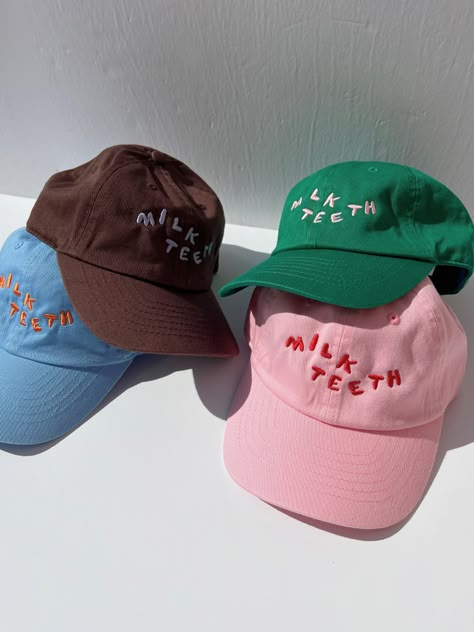 MILK TEETH CAP - Pink Cool Cap Ideas, Ball Cap Design, Cute Merch Ideas, Cool Caps Hat, Merch Hats, Cool Merch Ideas, Brand Merchandise Ideas, Embroidery On Hats, Baseball Cap Ideas