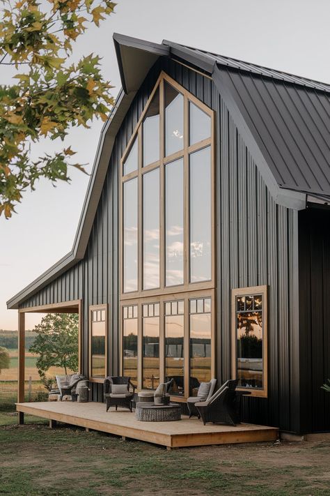 15 Modern Barndominium Exterior Ideas: Stylish Designs for Contemporary Living - My Decor Inspo Lofted Barndominium, Metal Home Exterior, Dark Modern Exterior, Black And White Barndominium, Modern Barn House Exterior, Dark Modern Farmhouse Exterior, Modern Barndominium Exterior, Barndominium Exterior Ideas, Barn Exterior Ideas