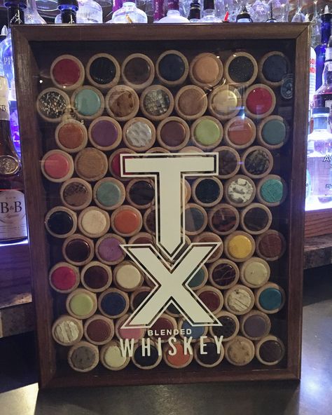 TX Whiskey cork shadow box located at Whiskeyta Club in Wichita Falls, TX. Tx Whiskey Bottle Crafts, Whiskey Cork Ideas, Tx Whiskey, Whiskey Bottle Crafts, Pendleton Whiskey, Cork Display, Cork Table, Bottle Decorations, Cork Ideas