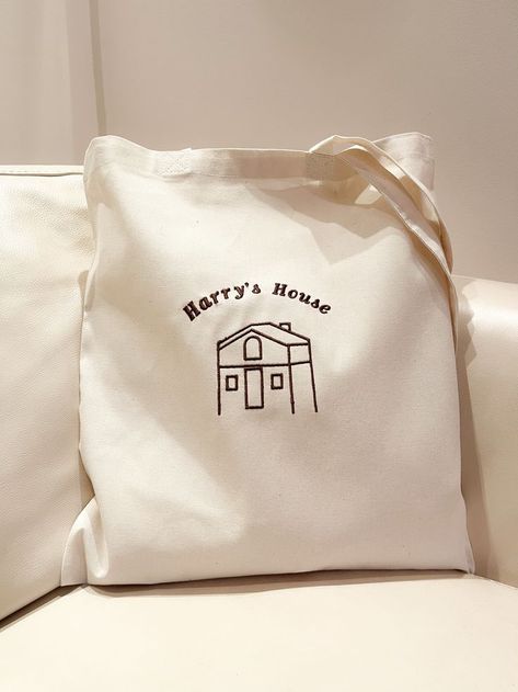 Harry's House Tote Bag | Harry Styles merch embroidery Harry Styles Merch, Cloud Craft, Vintage Surfboards, Pegboard Organization, Tag Cloud, Harry's House, Embroidered Tote Bag, Social Cause, Embroidered Tote