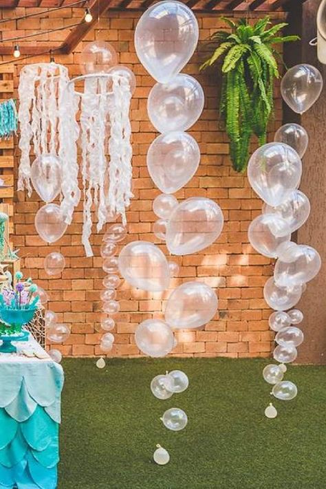 Balloons From Ceiling Party Ideas, Undersea Theme Birthday Party, Clear Balloon Bubbles Under The Sea, Diy Sea Themed Party Decorations, Under The Sea Party For Adults, Water Decorations Party, Backyard Under The Sea Party, Diy Clear Bubble Garland, Under The Sea Birthday Party For Adults