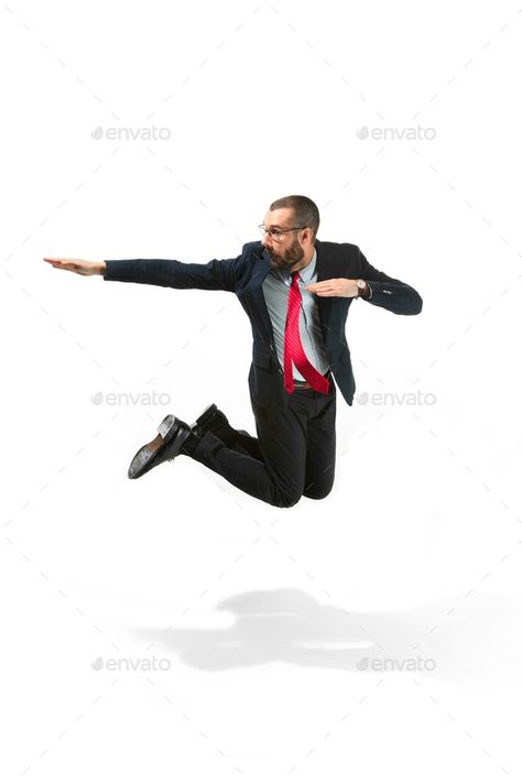 Funny cheerful businessman jumping in air over white background by master1305. Funny cheerful businessman jumping in air over white studio background. Jump of happy bearded young man in glasses, s...#air, #white, #background, #jumping Mexican Fonts, Jumping Poses, White Studio Background, Chalkboard Invitation Template, Diy Background, Business Logo Inspiration, Chalkboard Invitation, Background Diy, Logos Inspiration