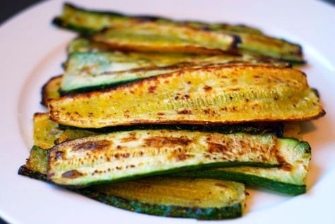 Broiled Zucchini (or Eggplant) | Award-Winning Paleo Recipes | Nom Nom Paleo.  Use a mister for the olive oil so that you're not generous like the recipe says.  After they are done you can top with some lemon or lime zest & juice Broiled Zucchini, Quesadilla Recipes Beef, Kale Smoothie Recipes, Foil Packet Meals, Nom Nom Paleo, Bake Zucchini, Vegetarian Cooking, Cauliflower Recipes, Vegetable Sides