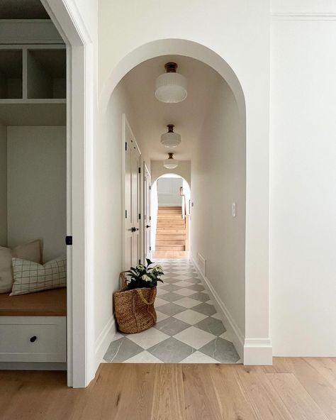 This arched hallway has been a favourite on here and I can’t agree more that it’s a pretty one! #hallway #arches #checkeredfloor @cercustomhomes Arch Hallway Entryway, Arch Hallways, Arch Entryway Interior, Fun Floor Tile, Hallway Arch, Arch Hallway, Arched Hallway, Arch Designs For Hall, Arch Entryway