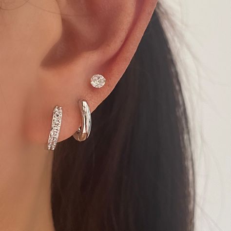 These are basic simple Silver Stud with Premium cubic zirconia, made of 925 sterling silver. Come ins 3 sizes -5mm, 4mm and 3mmMaterial: 925 Sterling Silver, Cubic ZirconiaSuitable for single use or stackingSold as a pairHypoallergenicNickel free and Lead free ♡ Have any questions or need advice on your order? Feel free to contact us. We are fast to reply. ♡ All orders are going out next business day. Silver Earrings 3 Holes, Silver Earring Stack Simple, Silver Earrings Diamond, Silver Earrings Aesthetic Vintage, 3rds Ear Piercing, Jewllery Ideas Silver, 3 Ear Piercings Silver, Silver Earrings Aesthetic Simple, Silver Earing Stacks