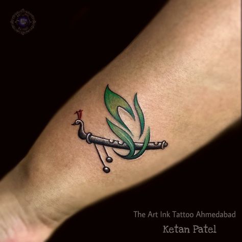 Best tattoo in Ahmedabad theartinktattoo Tattoo Ideas Female Lord Krishna, Tattoo Designs For Wrist Women, Kanha Ji Tattoo Design, Krishna Tatoos Tattoo Ideas, Woman Wrist Tattoo Ideas, Flute And Feather Tattoo, Flute Tattoo Designs For Women, Basuri Flute Tattoo, Flute Tatoos