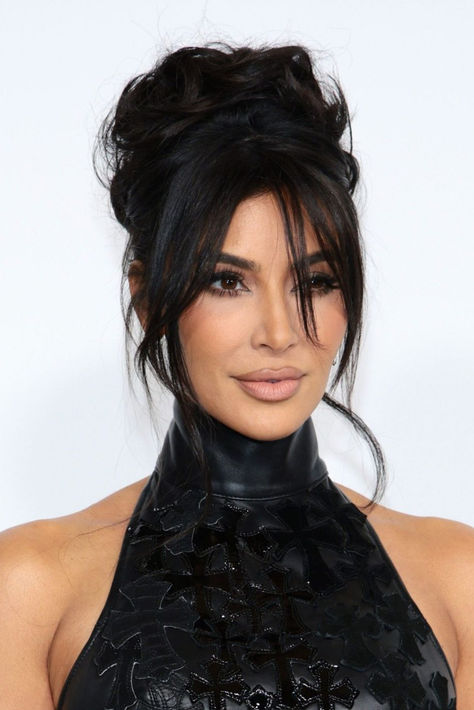 Kim Kardashian attended the 2023 CFDA Fashion Awards wearing a black Chrome Hearts gown. Kendall Jenner Kourtney Wedding Hair, Messy Updo Brown Hair, Kim Updo Hairstyles, Messy Bun Kim Kardashian, Kim Kardashian Hairstyles 2023, Kim Kardashian Up Do Hairstyles, Kim Kardashian Bangs Fringes 2023, Kim Kardashian Upstyles, Kim Kardashian Messy Bun Updo