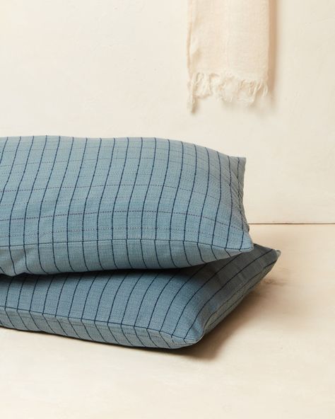 Our handwoven Grid Pillowcases add a pop of color to your bedspread. Pair them with the Grid Duvet or mix-and-match with our other bedding styles. Handwoven in Larráinzar, Mexico. Natural Fiber Decor, Bedding Pattern Mixing, Blue Green Bedding, Mismatched Bedding, Bedding Styling, Neutral Bed, Bed Linen Inspiration, Blue Linen Bedding, Neutral Bedding