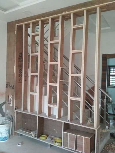 Designs by Carpenter Kerala Carpenters, Ernakulam | Kolo Ply Partition Design, Partition Between Living And Dining, Hall Partition, बेडरूम डिजाइन, Storage Lighting, Partition Designs, Staircase Interior Design, Wall Partition Design, House Main Door