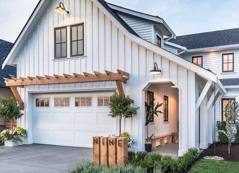 Modern Garage Trellis, Pergola Awning Over Garage, Cedar Trellis Over Garage, Wood Pergola Over Garage Door, Houses With Shiplap Exterior, Garage Doors Pergola, Wooden Trellis Over Garage Door, Vines Over Garage, Trellis Over Garage Door Diy