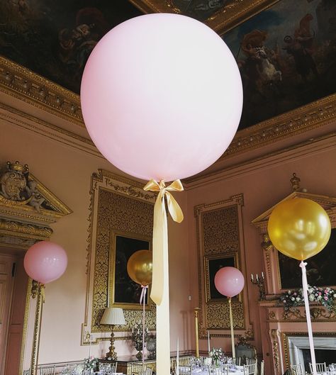 Our gorgeous pink and gold giant balloons tied with a satin ribbon bow at the splendidly sumptuous Stanford Hall in Leicestershire Balloon With Ribbon, Balloon Ribbon Ideas, Balloons With Ribbon, Big Balloon Decorations, Ribbon Balloon, Ballon Ribbon Ideas, Balloons Wedding, Bow Balloon Decorations, Balloon With Bow