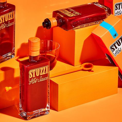 Stuzzi Hot Sauce Is the Subtle, Yet Sassy Condiment That's Made for Italian Cuisine — FOOD & WINE Hot Sauce Photography, Hot Sauce Ads, Hot Sauce Packaging Design, Hot Sauce Product Photography, Sauce Piquant, Hot Sauce Design, Chilli Sauce Packaging, Hot Sauce Bottle Design, Purple Photography