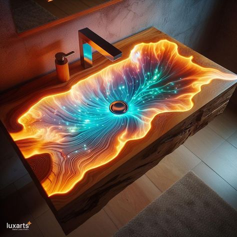 Glowing Epoxy Sink Material 💡🚰 #GlowingEpoxySink #InnovativeDesign #ModernUtility Illuminate your kitchen with the mesmerizing Glowing Epoxy Sink Material. Crafted with epoxy resin infused with glowing pigments, this sink material creates a stunning visual effect, adding an element of modern sophistication to your space. Elevate your kitchen decor with the Glowing Epoxy Sink Material, where every wash becomes a radiant experience. ✨🌊🪞 https://luxarts.net/glowing-epoxy-sink-material/ Epoxy Sink, Epoxy Bathroom, Casa Fantasy, Epoxy Countertop, Art Stand, Sink Design, Visual Effects, Craft Inspiration, Unique Home Decor