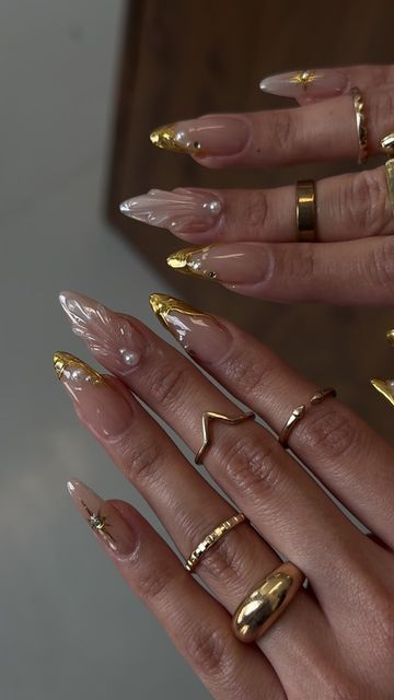 Nelsy G✨ on Instagram: "Gold nails inspo ✨ 
Name plate ring by: @foreverlinkx 
.
#nailinspo #nailtech #losangelesnails #losangelesnailtech #ontarionails #frenchnails #almondnails #nailtrends #ienails #fashioninspo #fallnails" Gold And Nude Nail Designs, Glittery Gold Nails, Gold Bday Nails, Fall Nails With White, Glam French Tip Nails, Nail Design Ideas 2024, Birthday Fall Nails, Gold Inspired Nails, Citrine Nails