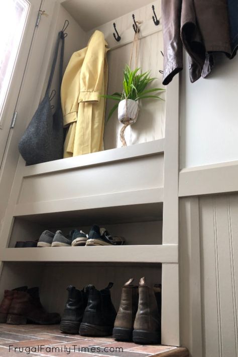 Wish you had space for a mudroom?You just might! We made an organized entryway mudroom space in a tiny stair landing! A built in mudroom may be your entryway storage solution too. We focused our DIY skills on adding a mudroom in a small space - and we've small mudroom ideas for you too! #mudroom #smallspace #entryway #storage #builtin Coat Storage Small Space, Built In Mudroom, Ikea Window Seat, Organized Entryway, Mdf Trim, Coat And Shoe Storage, Small Mudroom, Small Mudroom Ideas, Mudroom Storage