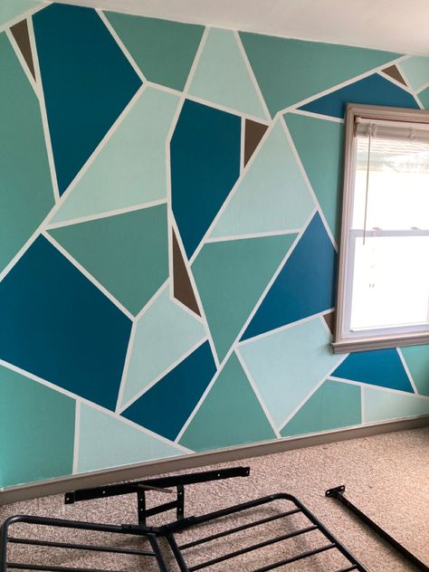 Modern Geometric Wall Paint, Turquoise Accent Wall Bedroom, Cyan Bedroom Walls, Teal Geometric Wall, Geometric Wall Paint Patterns Lowe's, Geometric Wall Pattern, Teal And Gold Geometric Wall Paint, Turquoise Accent Wall, Colorful Triangle Pattern Wall