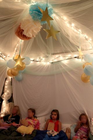 DIY party tent - I've done something similar to this with the girls' bunk beds. Diy Party Tent, Glamping Birthday Party, Glamping Birthday, Xmas Tree Lights, Girls Slumber Party, Glamping Party, Sleepover Birthday Parties, Kids Camping, Camping Birthday Party