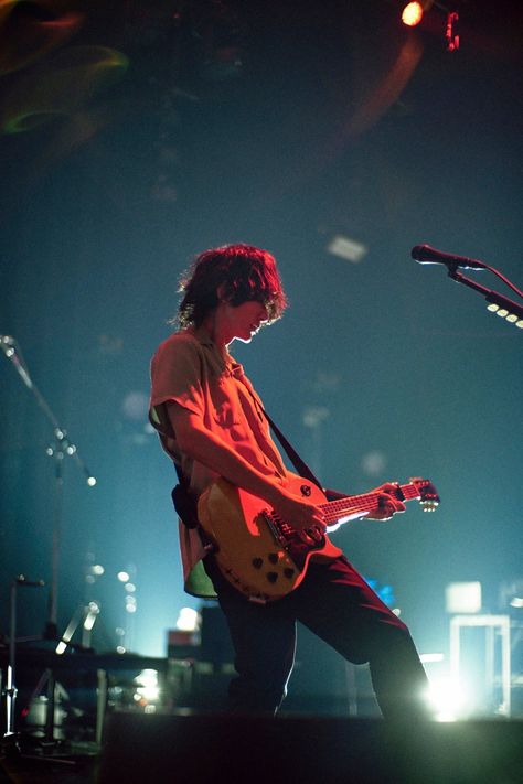 Person Playing Electric Guitar Reference, Chopping Wood Pose, Guitarist On Stage, Male Guitarist Pose Reference, Musician Photoshoot Outdoor, Street Musician Aesthetic, Mundane Poses, Getting Shot Pose Reference, Person Playing Electric Guitar