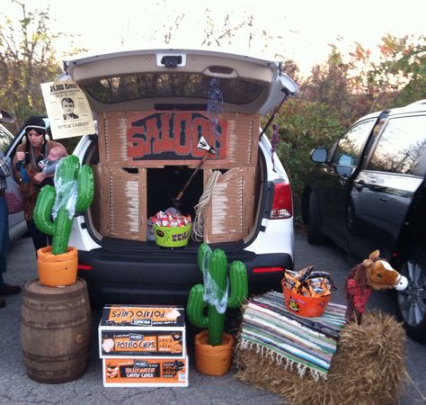 Saloon Trunk or Treat Country Themed Trunk Or Treat, Saloon Trunk Or Treat, Western Trunk Or Treat Ideas For Cars, Cowboy Theme Trunk Or Treat, Horse Trunk Or Treat, Wild West Trunk Or Treat Ideas, Trunk Or Treat Western Theme, Girl Scout Trunk Or Treat Theme, Trunk Or Treat Cowboy Theme