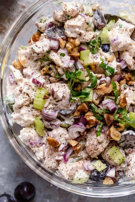 This Waldorf chicken salad is a recipe I’ve been making for years, and both me and my kids love it. It never fails when I’m short on time but need a nutritious, wholesome recipe for an easy lunch. It takes me just 10 ingredients to make, and–when I already have the shredded chicken on hand–I love that there’s no cooking required. Waldorf Salad With Chicken, Waldorf Chicken Salad Recipe, Rosemary Chicken Salad, Chicken Waldorf Salad, Waldorf Chicken Salad, Strawberry Chicken Salad, Cranberry Chicken Salad, Chicken Salad With Grapes, Chicken Salad With Apples