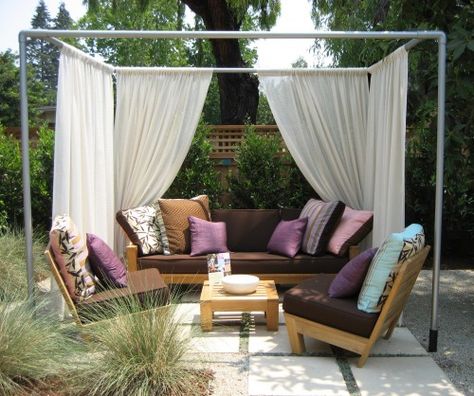 This simple and ingenious outdoor room (also designed by Whiteley) uses a frame of pvc pipe set into pvc sleeves pounded into the ground to define a sitting area. The curtain fabric is weather-resistant Sunbrella fabric. Diy Cabana, Pvc Pipe Ideas, Diy Gazebo, Pvc Pipe Projects, Backyard Canopy, Pvc Projects, Pvc Pipes, Pergola Plans, Canopy Outdoor