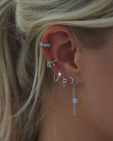 Silver jewellery 🤝 celestial designs✨ Shop your favourite styles in our Black Friday sale!🖤 Cute Silver Earrings Aesthetic, Silver Earrings Stack Aesthetic, Silver Jewelry Stack Earrings, Ear Piercing Inspo Silver, Silver Earing Stacks, Piercings Ear Silver, Silver Stacked Earrings, Silver Earrings Stack, Earring Stacks Silver