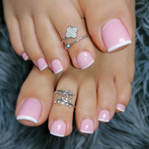 5. Pink Pedicure French Tips Most women are running around and getting ready for their Christmas holiday. Your feet bear your full weight throughout the day... Pedicure French, Pink Toe Nails, Pink Pedicure, Pretty Pedicures, Pedicure Designs Toenails, French Pedicure, Gel Pedicure, Pedicure Nail Designs, Pedicure Colors