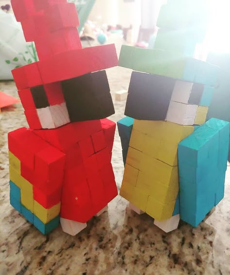 I am 13 years old and got the idea from tik tok they are made out of small wooden half inch blocks and I would be selling them for around 25 dollars plus shipping. There is an assortment of colors you could choose from you can find the colors if you search up Minecraft parrots on Google. Thank you for your time. Minecraft Parrot Wooden Block, Minecraft Wooden Cube Art, Minecraft Parrot Statue, Wooden Block Minecraft, Minecraft Wooden Block Crafts, Wooden Block Crafts, Minecraft Block Art, Minecraft Parrot, Wooden Blocks Diy