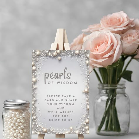 This Pearls of Wisdom Table Sign Template is from our DIAMONDS & PEARLS line. An elegant, editable, easy-to-personalise design. Easily upload and add your own details. Personalise your template in Canva, a simple-to-use template editor that works in your web browser (and via your mobile device). -------------------------------------- PRODUCT SPECIFICATION -------------------------------------- 1 x editable 5 x 7 Bridal Shower Pearls of Wisdom Table Sign Template. Please note: - Template size and Pearls Of Wisdom Party, Glitzy Bridal Shower Ideas, Pearls And Bows Bridal Shower Theme, Pearls And Prosecco Bridal Shower Theme Decor, Pearl Theme Bridal Shower Ideas, Prosecco And Pearls Bridal Shower Theme, Pearls Bridal Shower Theme, White Bridal Shower Decor, Pearl Bridal Shower Theme