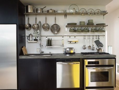 We love open kitchens, but we also like organized kitchens. When kitchen space is at a premium, open rail storage systems are great space savers and keep utensils and supplies within easy reach. The systems can be configured to fit any space, from a single rail over the range to a full-kitchen system. Ikea Grundtal Kitchen, Dapur Ikea, Stainless Steel Kitchen Shelves, Vintage Kitchen Remodel, Kitchen Wall Shelves, Galley Kitchen Remodel, Kitchen Remodel Cost, Kabinet Dapur, Stainless Kitchen