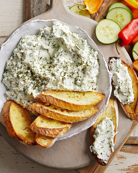 Basil, oregano, and chives brighten up this rich Parmesan and ricotta cheese spread. Start your next dinner party with this easy, cheesy appetizer. Just add slices of baguette and veggies for dipping! Healthy Potluck, Ricotta Cheese Recipes, High Protein Dishes, Cheesy Appetizer, Dips And Spreads, Dips Appetizers, Best Healthy Recipes, Appetizers And Dips, Cheese Spread