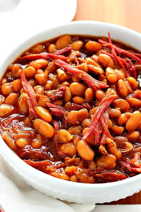 Slow Cooker Baked Beans - comfort food classic made easy in the slow cooker with dried beans (no cans!). Use a leftover ham bone or bacon for best flavor. This recipe is a family favorite! Baked Beans With Ham Hock, Baked Beans And Ham, Baked Beans With Ham Bone, Baked Beans With Ham, Leftover Ham Bone, Holiday Ham Recipes, Slow Cooker Baked Beans, Slow Cooker Baking, Beans Recipes