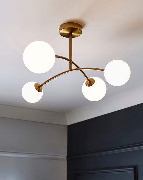 This Joanna Hope semi-flush ceiling light in gold has adjustable arms to direct light where needed and is finished with frosted white glass shades. Semi Flush Ceiling Lights, Flush Ceiling Lights, White Glass, Ceiling Light, Glass Shades, Ceiling, Ceiling Lights, Shades, Glass