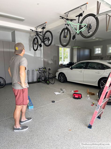 Bike Hanging Ideas Garage, Storing Bikes In Garage, Garage Organization Bikes, Bicycle Storage Garage, Garage Hanging Storage, Bicycle Garage, Bike Garage, Bike Rack Garage, Garage Organization Systems