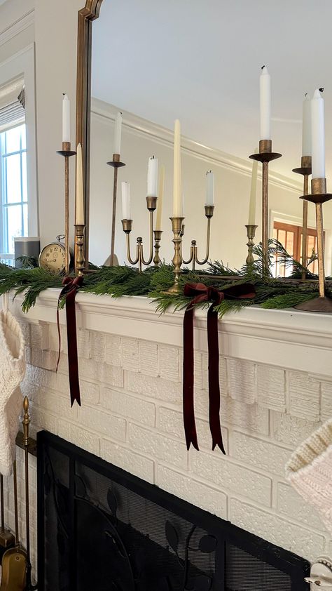 Sneak a peek into our holiday decor. I wanted to keep things pretty neutral (surprise!), natural and simple.  Photo by 13th Avenue Interiors l Leah Garczynski Christmas Decor On Mantle, No Garland Christmas Mantle, Christmas Mantle Decor With Mirror, Minimal Christmas Mantle, Side Board Christmas Decor, Simple Christmas Mantle Decor, Simple Christmas Mantle, Scandinavian Christmas Decor Ideas, Christmas Mantle Ideas