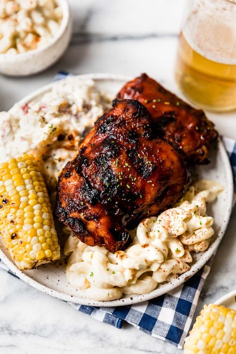 Say hello to your newest go-to summer staple, the best Grilled BBQ Chicken recipe! Barbecue chicken is totally classic but surprisingly difficult to do the right way. This easy recipe utilizes a quick BBQ chicken marinade, a flavorful BBQ chicken dry rub, & indirect grilling, yielding perfectly tender, juicy, & flavorful BBQ chicken every time. The only grilled barbecue chicken recipe you'll need from now on! #bbqchicken #grilledbbqchicken #grilledchicken #grilledchickenrecipes #barbecuechicken Bbq Grilled Chicken Recipes, Summer Dinner Recipes Grill, Bbq Chicken Marinade, Poulet Tikka Masala, Chicken Seasoning Recipes, Best Bbq Chicken, Barbecue Chicken Recipe, Buffalo Chicken Wraps, Grilled Bbq Chicken