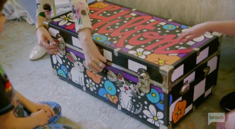 Summer Camp Trunk Decorating Ideas, Camp Trunk Decorating Ideas, Pine Cove Camp, Kameron Westcott, Camp Trunks, Overnight Camp, Painted Trunk, Tv Reality, Big Blonde Hair