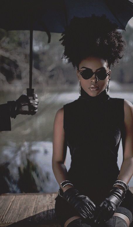 Black Female Assassin Aesthetic, Black Spy Outfit Women, Bond Villain Aesthetic, Spy Photoshoot Ideas, Spy Aesthetics Female, Black Assassin, 1960s Spy Aesthetic, Spy Movie Aesthetic, Spy Woman Aesthetic