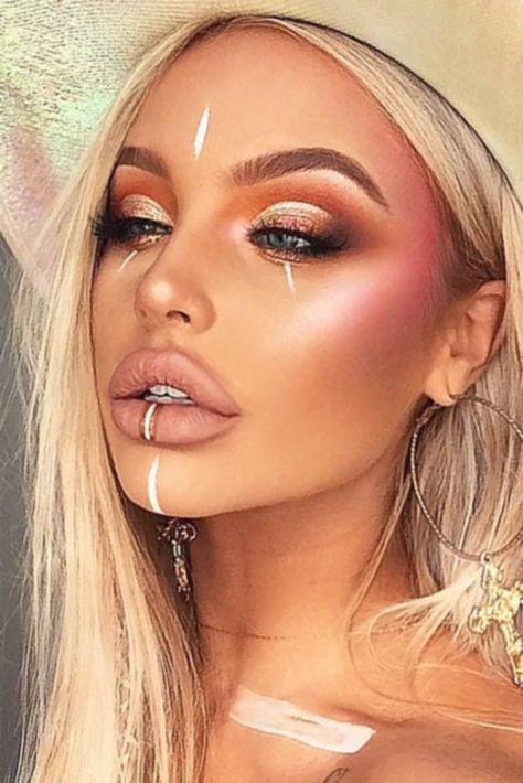 30 Coachella Makeup Inspired Looks To Be The Real Hit | Page 3 of 6 Boho Face Paint, Rave Face Paint, Boho Festival Makeup, Coachella Make-up, Coloured Braids, Gold Face Paint, Festival Makeup Rhinestones, Festival Eye Makeup, Festival Makeup Tutorial