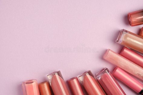 Lip gloss in pink natural colors lie on the right side of the frame against a lilac background royalty free stock photo Background Horizontal, Lilac Background, The Frame, Natural Colors, Right Side, Natural Color, Lip Gloss, Lilac, Photo Image