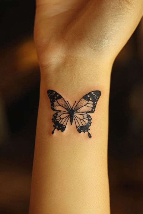 butterfly-tattoo Butterfly Thumb Tattoo, Butterfly Forearm Tattoo Women, Sideways Butterfly Tattoo, Butterfly Tattoo Forearm, Butterfly Tattoo On Wrist, Realistic Butterfly Tattoo, Butterfly Tattoo Ideas, Thumb Tattoos, Butterfly Wrist Tattoo