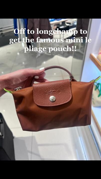 Getting thr famous longchamp le pliage mini pouch!!! Its sold out ever... | TikTok Longchamp Le Pliage Pouch, Longchamp Pouch, Longchamp Le Pliage Mini, Longchamp Mini Le Pliage, Winter 23, Mini Pouch, What In My Bag, Mini Pouches, Longchamp Le Pliage