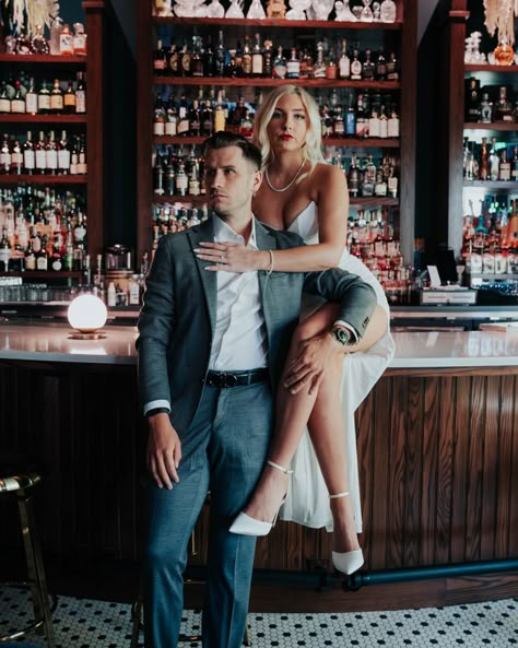 Spicy Engagement Photos Hotel, Pool Table Couple Photoshoot, Whiskey Engagement Photos, Hotel Lobby Couple Photoshoot, Couple Chair Poses, Couples Bar Photoshoot, Casino Engagement Photos, Fancy Couple Photoshoot, Bar Couple Photoshoot