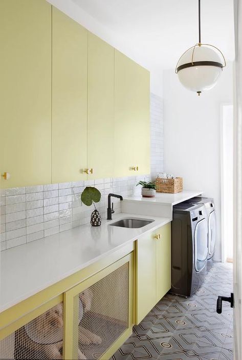 Gray Washer And Dryer, Yellow Laundry Room, Yellow Laundry, Dog Cabinet, Yellow Laundry Rooms, Black Quartz Countertops, Contemporary Laundry Room, Transitional Laundry Room, Laundry Room Paint Color