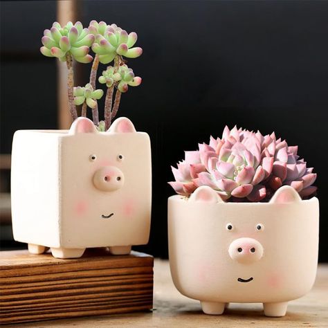 PRICES MAY VARY. 【What Will You Get?】You will get 2 PCS cute pig ceramic planters with small size:9*7*7/3.5*2.7*2.7Inch,8.8*7.8*7.7cm/3.5*3*3Inch. Plants are not included. 【Material】Each pig-shaped cute flower pot is meticulously crafted through exquisite manual firing. We carefully select high-quality ceramic materials and employ refined techniques to shape these adorable and lively pig forms, injecting a delightful sense of fun and vitality into your plants with our funny planters. 【Succulent Pinch Pots Ceramic, Flower Pens, Funny Planters, Succulent Planters, Pig Ceramic, Planters For Indoor Plants, Pottery Pinch Pot, Plant Store, Pineapple Planting