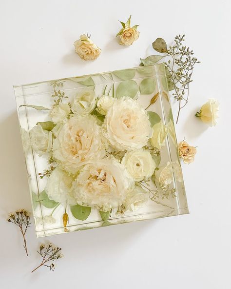 Rejoiceandblossom on Instagram: “Classic white bouquet in an 8x8 resin block. . . . . . #bouquetofflowers #bouquetpreservation #flowerpreservation #driedflowers #floralart…” Epoxy Bouquet, Resin Wedding Bouquet, Resin Bouquet, Resin Preservation, Resin Flower Block, Wedding Bouquet In Resin, Wedding Bouquet Resin, Flower Exhibition, Preserving Wedding Bouquet In Resin