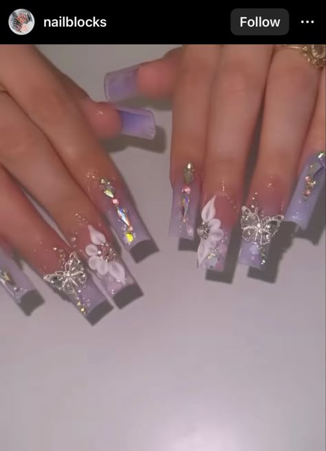 Prom Nail Ideas Purple, Elegant Nails Lavender, Purple Acrylic Nails With Charms, Lilac Nails For Quinceanera, Lavender Purple Acrylic Nails, Lilac Quinceanera Nails Butterfly, Lavender Butterfly Nails Quince, Light Purple Homecoming Couple, Purple Latina Nails