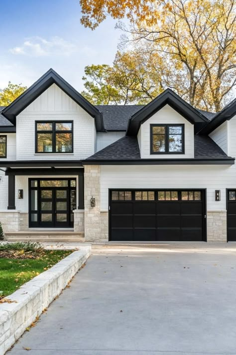 White Siding Black Windows Cedar Accents, Gray And White Brick House Exterior, Black Roof Cream House, Off White Stone House Exterior, Color Schemes Exterior House, Black Siding White Brick, White Brick Exterior With Wood Accents, Black And White Brick House Exterior, White Homes With Black Trim