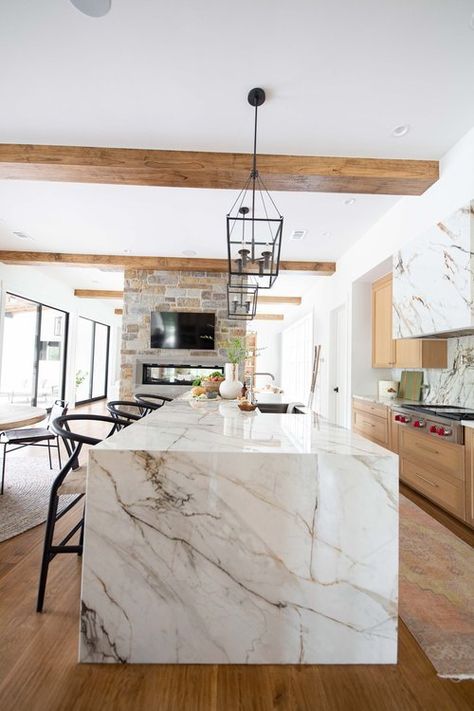 Waterfall Island With Cooktop, Two Tone Island Countertop, Statement Island Countertop, Porcelain Waterfall Island, Quartz Island Waterfall, Light Stone Countertops, Waterfall Granite Island, Quartz Waterfall Countertop, Lightwood Kitchen