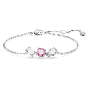 Accented with a vibrant flourish of colour, this Mesmera bracelet is ready to impress. The rhodium plated design is worn on a delicate chain with a hanging elongation and features a trio of prong-set Swarovski Zirconia in varying shapes, including a central round stone in blush pink. A bold mix of cuts that would make a wondrous gift. Pink And Silver Jewelry, Swarovski Jewelry Aesthetic, Swavorski Bracelet, Bracelets Expensive, Swarovski Jewelry Bracelet, Pink Pandora Bracelet, Pink Crystal Bracelet, Pretty Accessories, Pink Swarovski